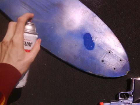 spray painting longboard